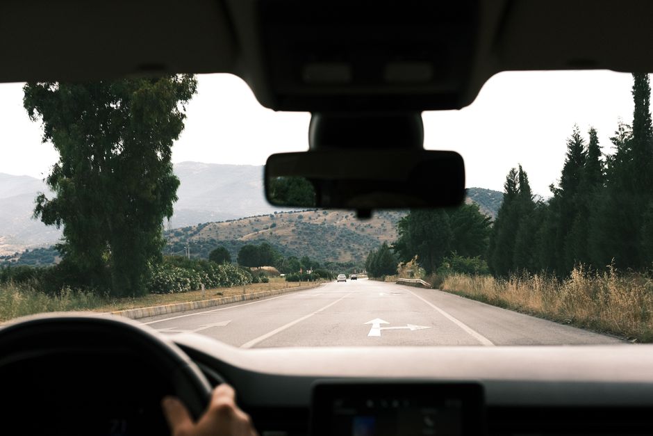 View from inside a car driving with a flawlessly clear new windshield